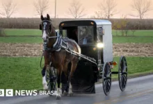Membros da comunidade amish em área rural