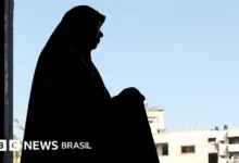 Mulheres e crianças em acampamento na Faixa de Gaza